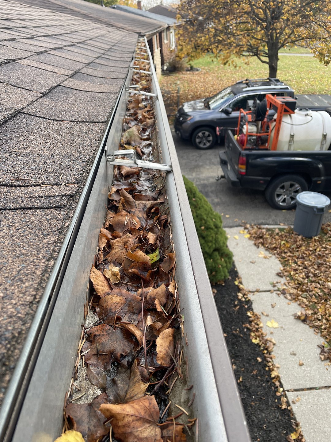 Eavestrough Gutter Cleaning Performed in Paris Ontario and surrounding areas 
